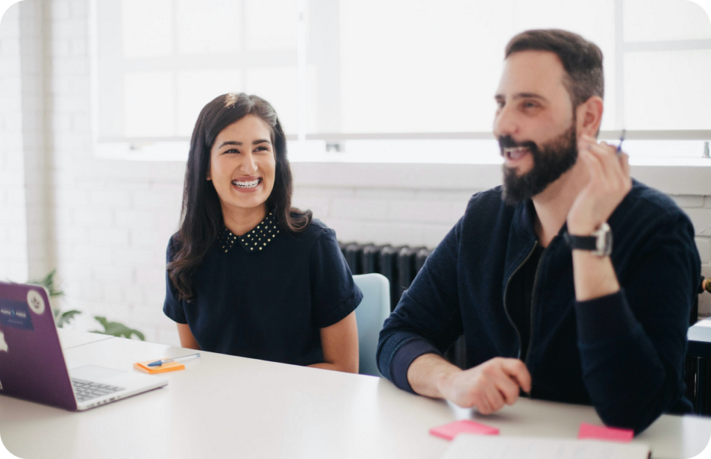 Office workers smiling